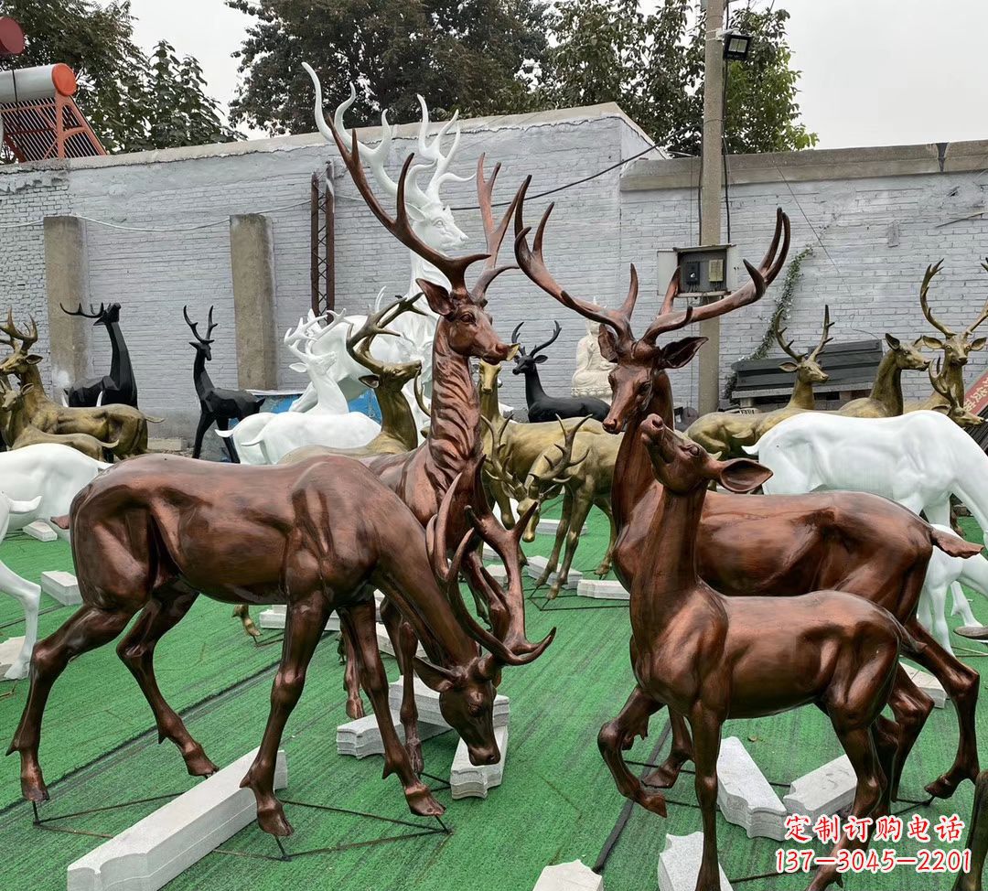 青海玻璃钢仿铜群鹿雕塑——精美动物雕塑装点公园