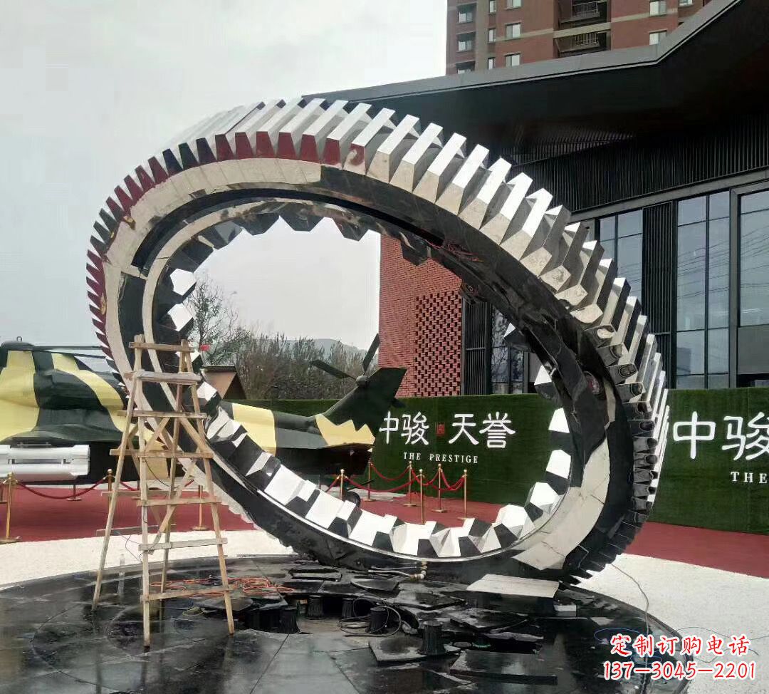 青海不锈钢抽象齿轮雕塑1