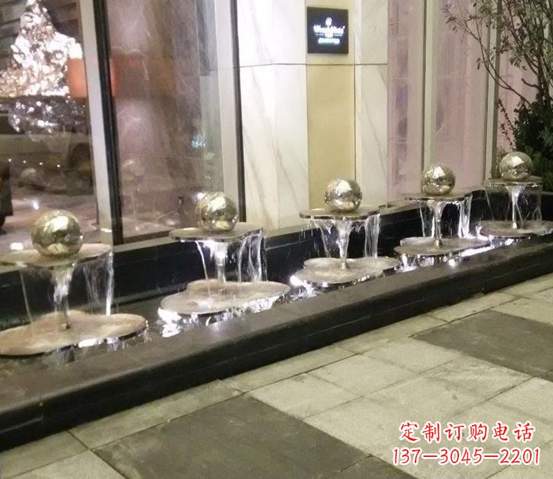 青海不锈钢小喷泉雕塑——美化环境的艺术